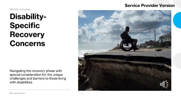 Disability-Specific Recovery Concerns “A man in a wheelchair sits beside a chunk of collapsed coastal pavement overlooking a cloudy ocean shoreline, with homes visible in the distance.”