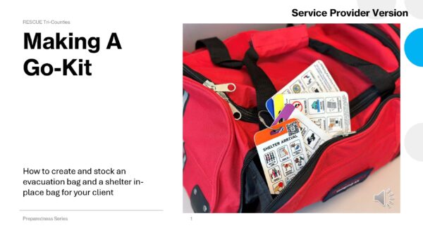 Making a Go-Kit “Red duffel bag unzipped to reveal laminated pictogram cards for shelter arrival, water, and emergency steps attached by a metal ring.”