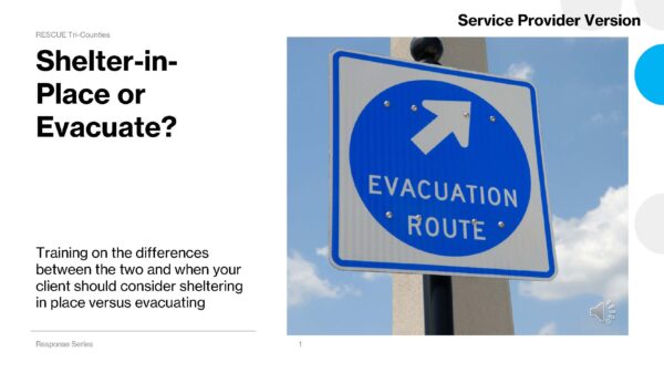 Shelter-in-Place or Evacuate? “Close-up of a blue circular road sign reading ‘Evacuation Route’ with a white arrow pointing diagonally up and right.”